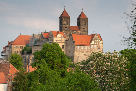 Panoramic image of the convent of Quedlinburg in evening sunlight, Germany, Europeのeditorial素材
