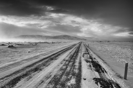 Road into the blizzard, winter in Iceland, Europeの写真素材