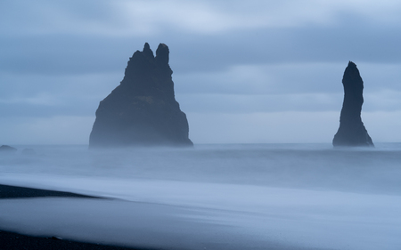 Rock spire of Reynisdrangur, coast of Reynisfjara close to Vik, Iceland, Europeの写真素材