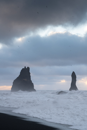 Rock spire of Reynisdrangur, coast of Reynisfjara close to Vik, Iceland, Europeの写真素材