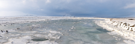 Panoramic view on a frozen river, winter in Iceland, Europeの写真素材