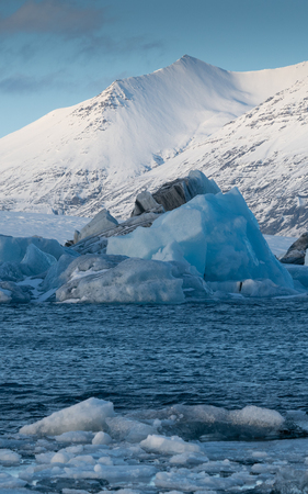 Icebergs in the glacier lagoon of Joekulsarlon, winter in Iceland, Europeの写真素材
