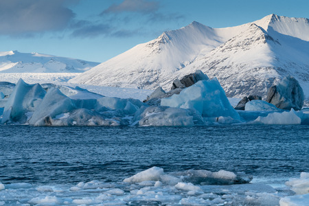Icebergs in the glacier lagoon of Joekulsarlon, winter in Iceland, Europeの写真素材