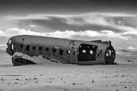 VIK, ICELAND - FEBRUARY 15, 2019: Wreck of the crashed DC 3 plane, covered by snow on a winter day...