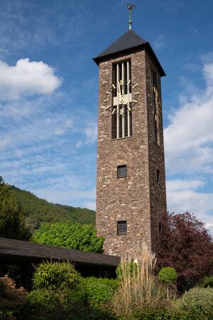 Bell tower of monastery Ebernach with blue sky, Cochem, Germanyの写真素材