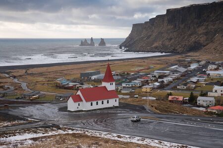 VIK, ICELAND - FEBRUARY 12, 2019: Panoramic image of the small village Vik close to the southern coast of Iceland on February 12, 2019 in Iceland, Europeのeditorial素材