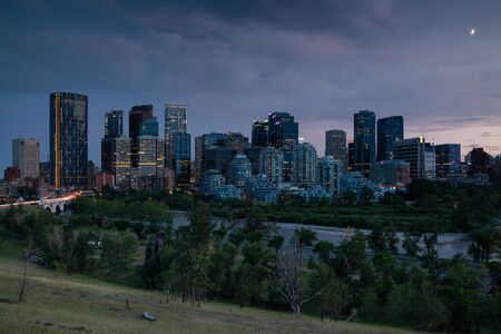 CALGARY, CANADA - AUGUST 5, 2019: Panoramic image of the skyline of Calgary during sunset on August 5, 2019 in Alberta, Canadaのeditorial素材