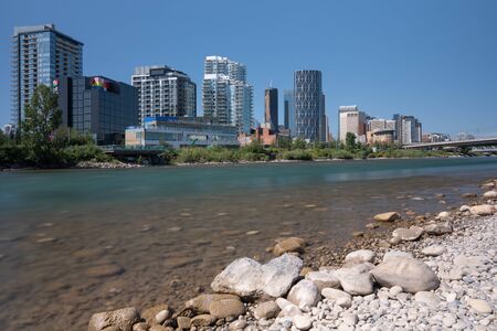 CALGARY, CANADA - AUGUST 5, 2019: Panoramic image of the skyline of Calgary on a sunny day with blue sky on August 5, 2019 in Alberta, Canadaのeditorial素材