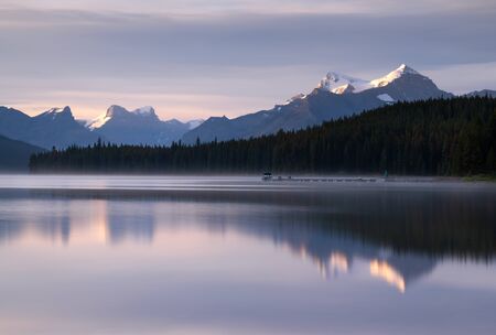 Long exposure panoramic image of the Maligne Lake close to Jasper with early morning mood, Alberta, Canadaの写真素材
