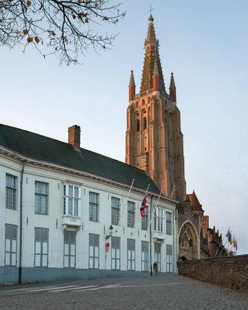 Street onto the church of our Lady, historic city of Bruges, Belgiumの写真素材