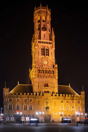 BRUGES, BELGIUM - OCTOBER 31, 2019: Evening mood with illuminated buildings in the historic city of Bruges on October 31, 2019 in Belgiumのeditorial素材