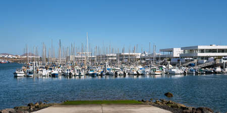 ARRECIFE, SPAIN - JANUARY 28, 2020: Panoramic image of the marina of Arrecife on a sunny day with clear sky on January 28, 2020 in Lanzarote, Spainのeditorial素材