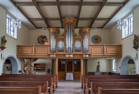 SCHMALLENBERG, GERMANY - JUNE 8, 2020: View throught the main aisle of the parish church Saint Blasius on June 8, 2020 in Schmallenberg, Germanyのeditorial素材