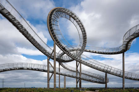 DUISBURG, GERMANY - AUGUST 29, 2020: Tiger and Turtle, landmark of Ruhr Metropolis against sky on August 29, 2020 in Duisburg, Germanyのeditorial素材