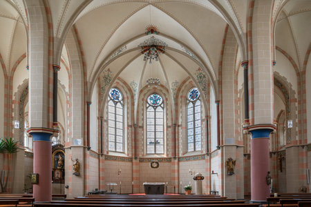 SANKT ALDEGUND, GERMANY - JUNE 20, 2020: View throught the main aisle of the parish church Saint Bartholomew on June 20, 2020 in Sankt Aldegund, Moselle, Germanyのeditorial素材