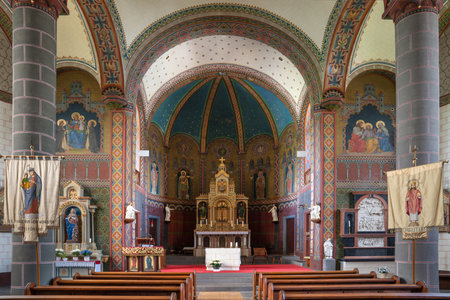 VALWIG, GERMANY - JUNE 22, 2020: View throught the main aisle of the parish church Saint Martin on June 22, 2020 in Valwig, Moselle, Germanyのeditorial素材