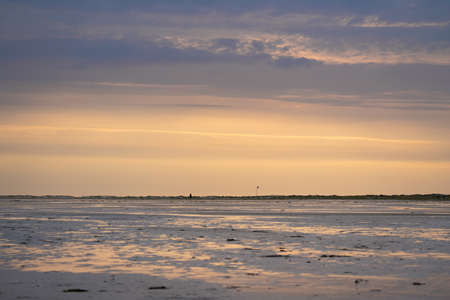 Panoramic image of the coastal landscape of Amrum at sunset, North Sea, Germanyの写真素材