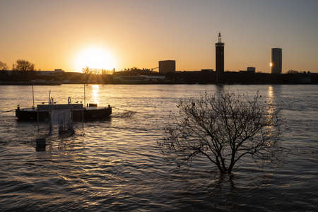 COLOGNE, GERMANY - FEBRUARY 4, 2021: High water on the river Rhine in Cologne on February 4, 2021 in Germanyのeditorial素材