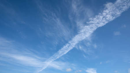 Evening sky with pastel-colored cloudsの写真素材