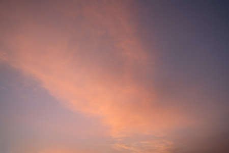 Morning sky with pastel-colored cloudsの写真素材