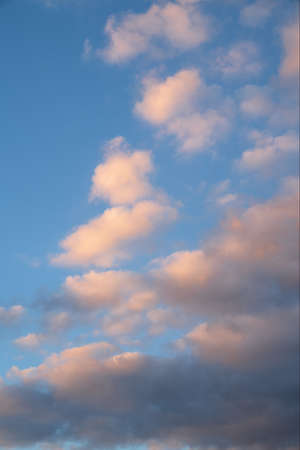 Morning sky with pastel-colored cloudsの写真素材