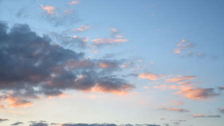 Morning sky with pastel-colored cloudsの写真素材