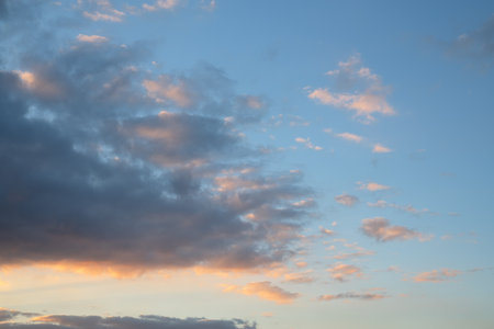 Evening sky with pastel-colored cloudsの写真素材
