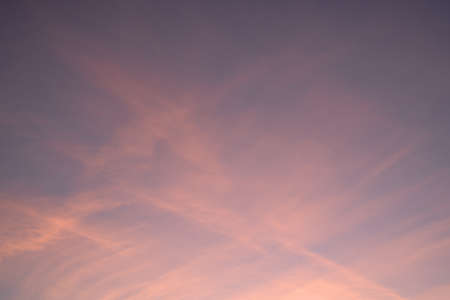Evening sky with pastel-colored cloudsの写真素材