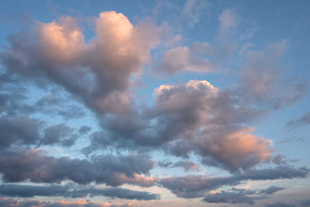 Evening sky with pastel-colored cloudsの写真素材