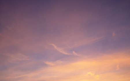 Morning sky with pastel-colored cloudsの写真素材