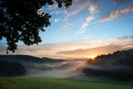 Panoramic image of scenic view on a foggy morning, Bergisches Land, Odenthal, Germanyの写真素材