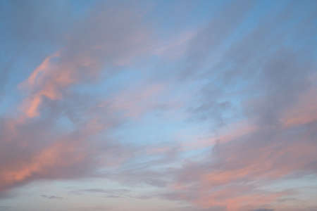 Evening sky with pastel-colored cloudsの写真素材