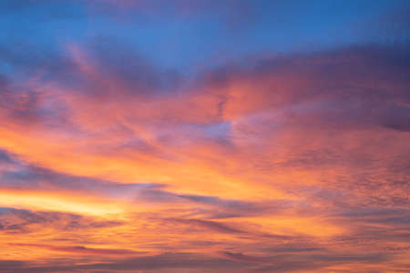 Evening sky with pastel-colored cloudsの写真素材