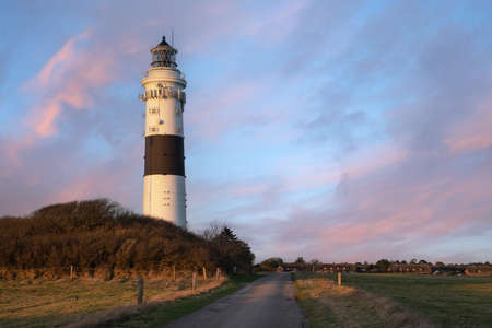 Panoramic image of Kampen lighthouse against sky, Sylt, North Frisia, Germanyの写真素材