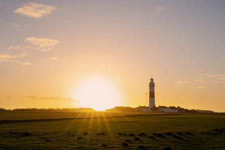 Panoramic image of Kampen lighthouse against sky, Sylt, North Frisia, Germanyの写真素材