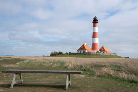 Panoramic image of Westerhever lighthouse against sky, North Frisia, Germanyの写真素材