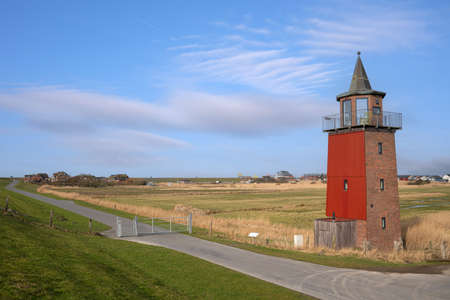 Panoramic image of Dagebuell lighthouse against sky, North Frisia, Germanyの写真素材