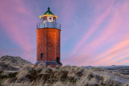 Panoramic image of Kampen lighthouse against evening sky, Sylt, North Frisia, Germanyの写真素材