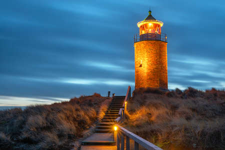 Panoramic image of Kampen lighthouse against evening sky, Sylt, North Frisia, Germanyの写真素材