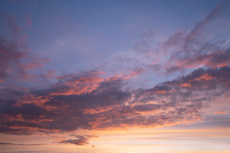 Evening sky with pastel-colored cloudsの写真素材