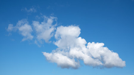 View to sky with cumulus cloudsの写真素材