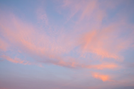 Evening sky with pastel-colored cloudsの写真素材