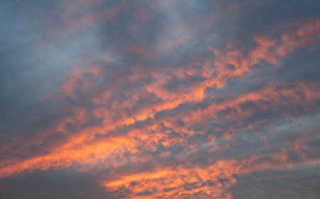 Evening sky with pastel-colored cloudsの写真素材