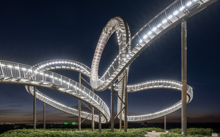 DUISBURG, GERMANY - JUNE 12, 2022: Tiger and Turtle, landmark of Ruhr Metropolis against sky on June 12, 2022 in Duisburg, Germanyのeditorial素材
