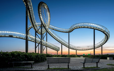 DUISBURG, GERMANY - JUNE 12, 2022: Tiger and Turtle, landmark of Ruhr Metropolis against sky on June 12, 2022 in Duisburg, Germanyのeditorial素材