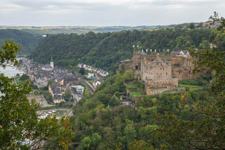 SANKT GOAR, GERMANY - OCTOBER 3, 2021: Panoramic image of Sankt Goar with Rheinfels castle against cloudy sky on October 3, 2021 in the Rhine Valley, Rhineland-Palatinate, Germanyのeditorial素材