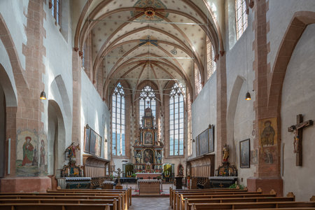 OBERWESEL, GERMANY - OCTOBER 4, 2021: View throught the main aisle of the parish church Saint Martin on October 4, 2021 in Germanyのeditorial素材