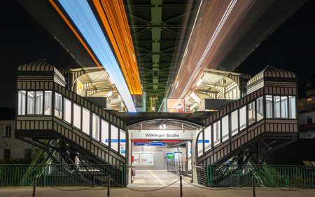 WUPPERTAL, GERMANY - NOVEMBER 12, 2022: Light trails around the suspension railway station Voelklinger Strasse in Wuppertal on November 12, 2022 in Bergisches Land, Germanyのeditorial素材