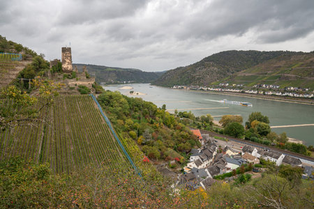 NIEDERHEIMBACH, GERMANY - OCTOBER 6, 2021: Panoramic image of small village Niederheimbach with Fuerstenberg castle close to the Rhine river on October 6, 2021 in the Rhine valley, Germanyのeditorial素材
