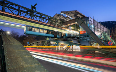 WUPPERTAL, GERMANY - JANUARY 28, 2023: Light trails around the suspension railway station Pestalozzi street in Wuppertal on January 28, 2023 in Bergisches Land, Germanyのeditorial素材
